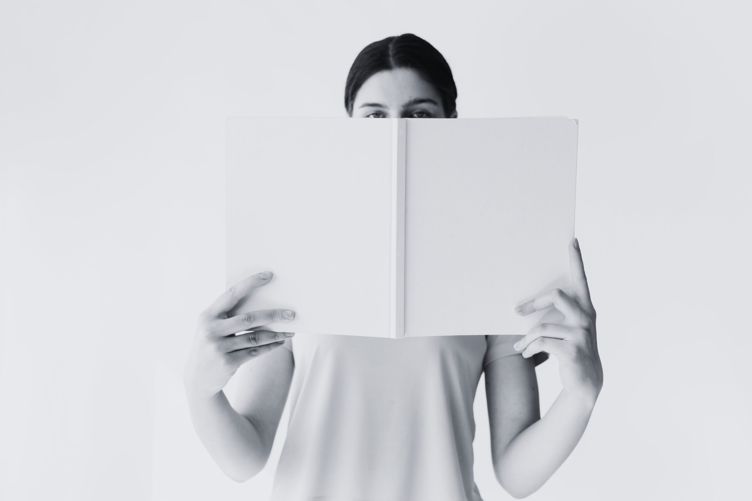 Person holding blank paper representing new ideas