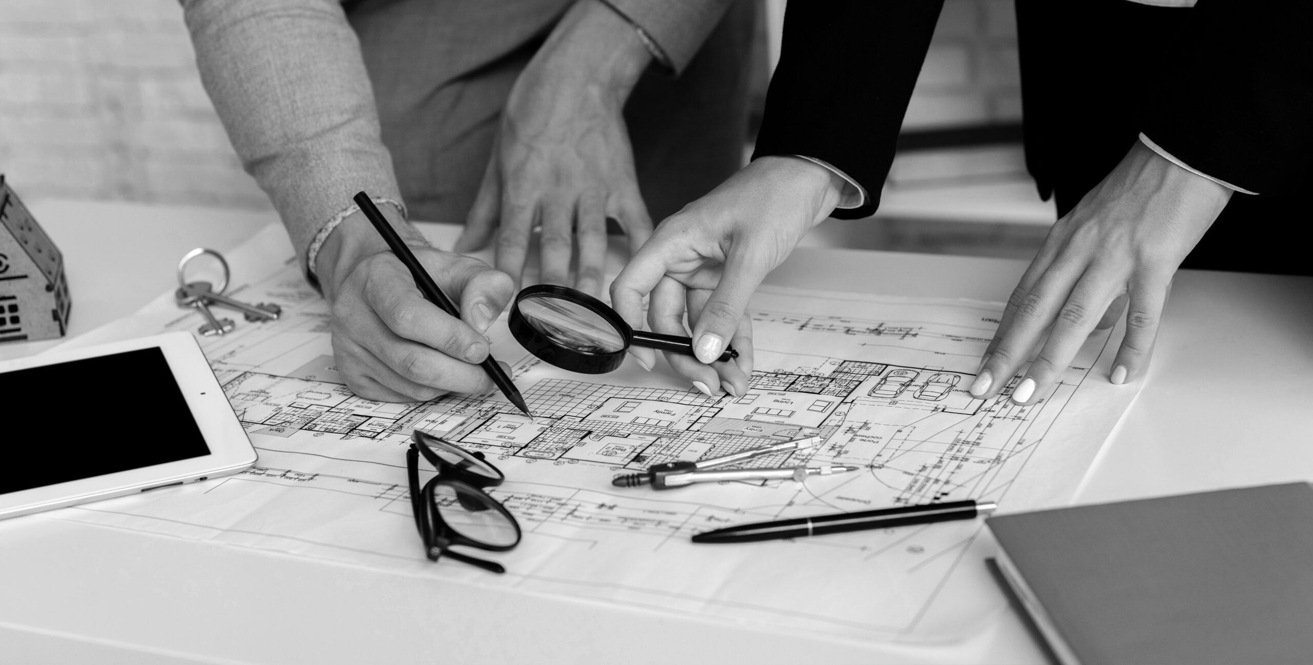 Team planning real estate marketing ideas together